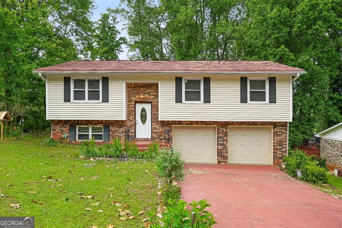4 bedroom, 2.5 bathroom, 1,826 sq ft single family residence sold at 1476 Indian Forest Trail, Stone Mountain, GA 30083