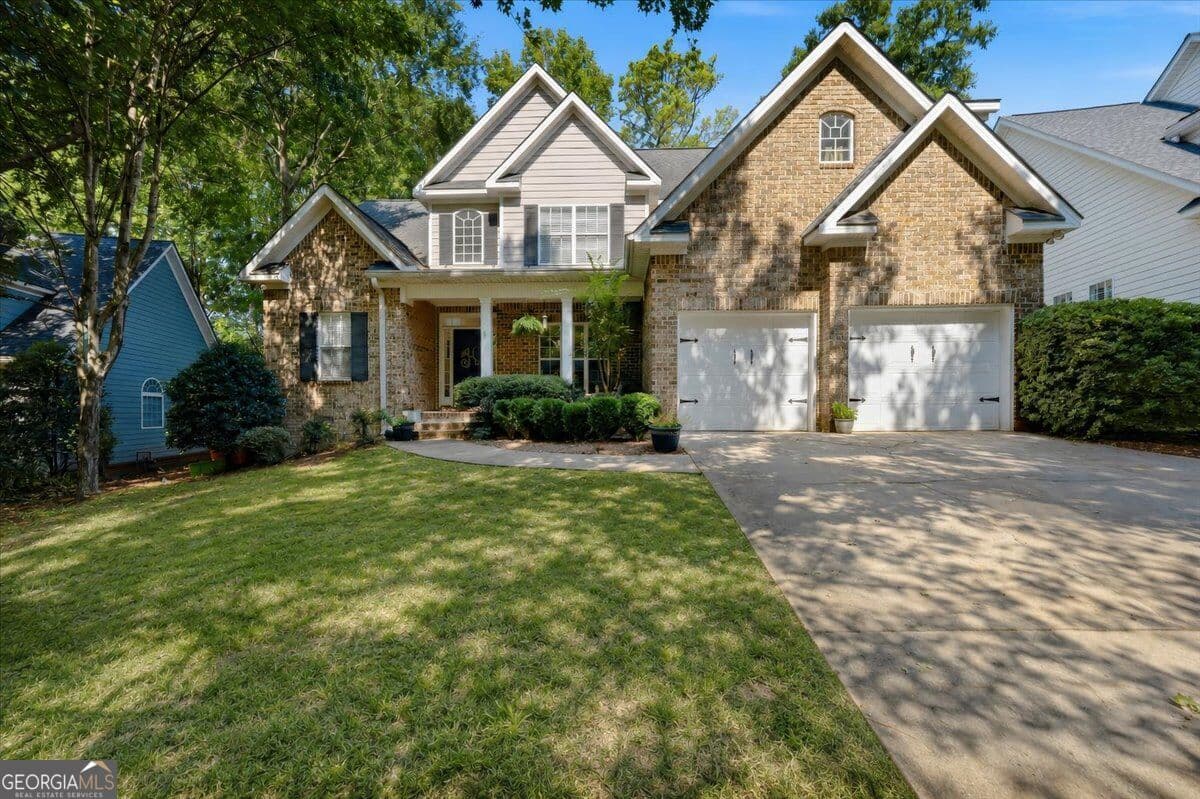 4 bedroom, 2.5 bathroom, 2,371 sq ft single family residence for sale at 920 Huntcliffe Drive, Macon, GA 31210 — photo 1 of 40
