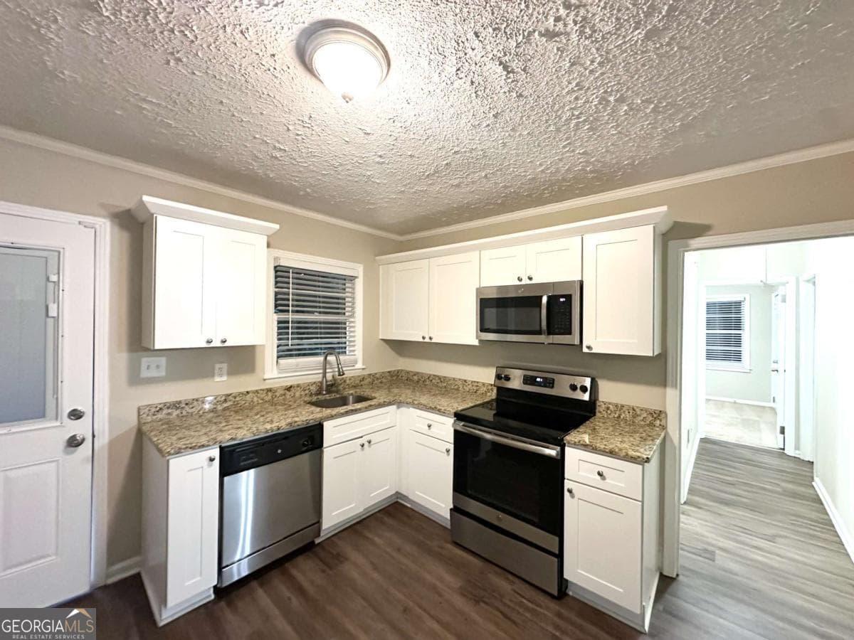 2 bedroom, 1 bathroom, 925 sq ft single family residence for sale at 2239 Nelms Drive, Atlanta, GA 30315 — photo 2