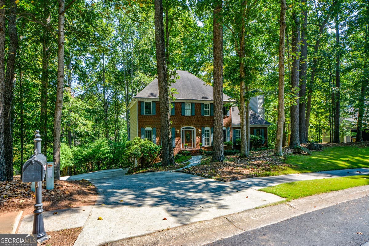 4 bedroom, 3 bathroom, 3,380 sq ft single family residence for sale at 3515 Stone Cliff Way, Woodstock, GA 30189 — photo 3