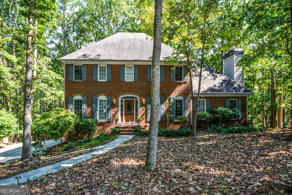 4 bedroom, 3 bathroom, 3,380 sq ft single family residence for sale at 3515 Stone Cliff Way, Woodstock, GA 30189 — photo 1 of 94