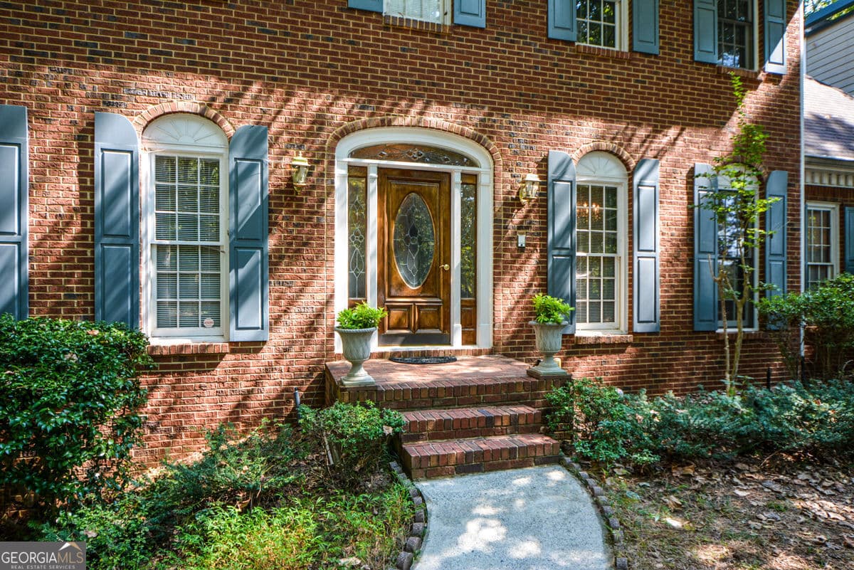 4 bedroom, 3 bathroom, 3,380 sq ft single family residence for sale at 3515 Stone Cliff Way, Woodstock, GA 30189 — photo 5