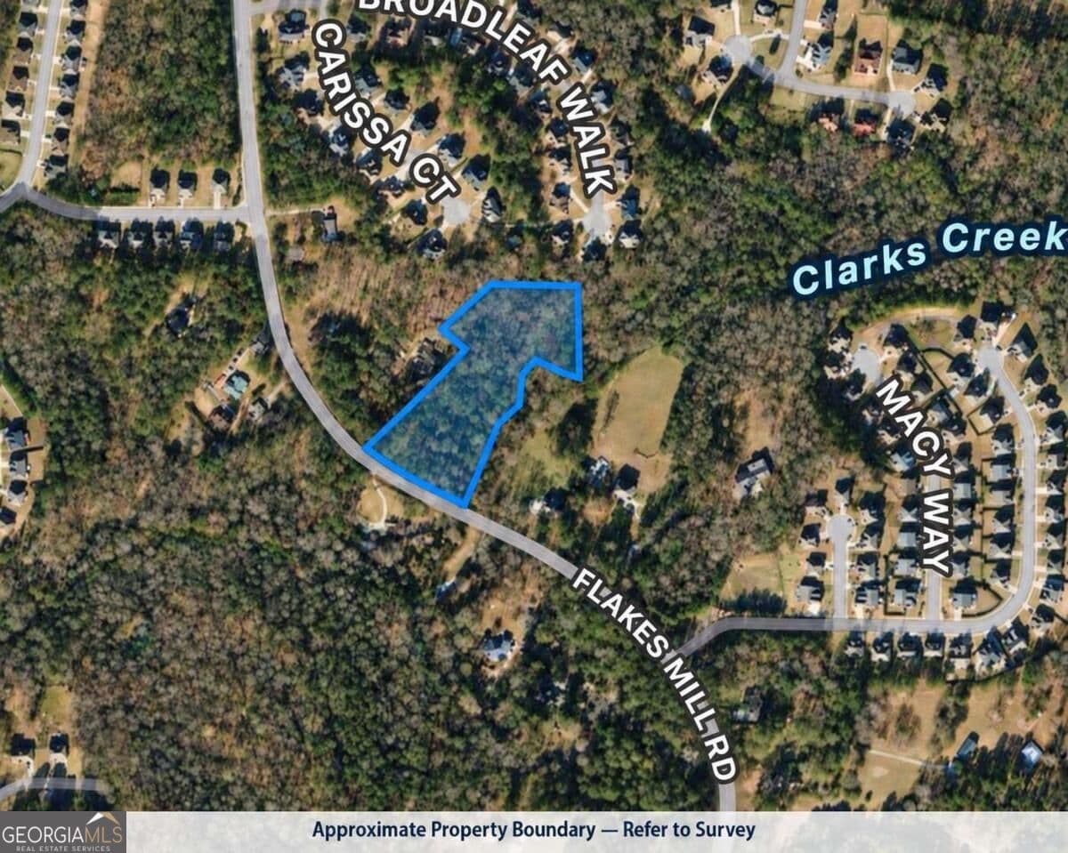 residential lot for sale at 4824 Flakes Mill Road, Ellenwood, GA 30294 — photo 1 of 10