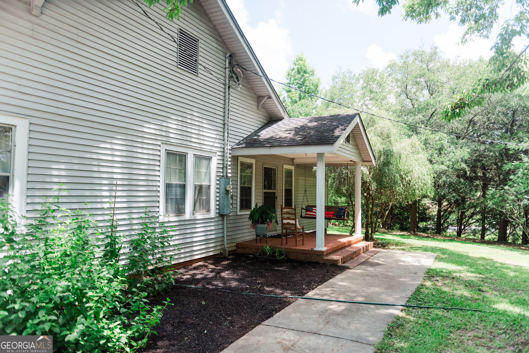 3 bedroom, 2 bathroom, 1,602 sq ft single family residence for sale at 348 Americus Highway, Butler, GA 31006 — photo 2