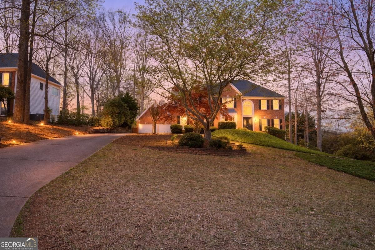 4 bedroom, 4 bathroom, 4,097 sq ft single family residence sold at 6450 Oak Valley Drive, Cumming, GA 30040