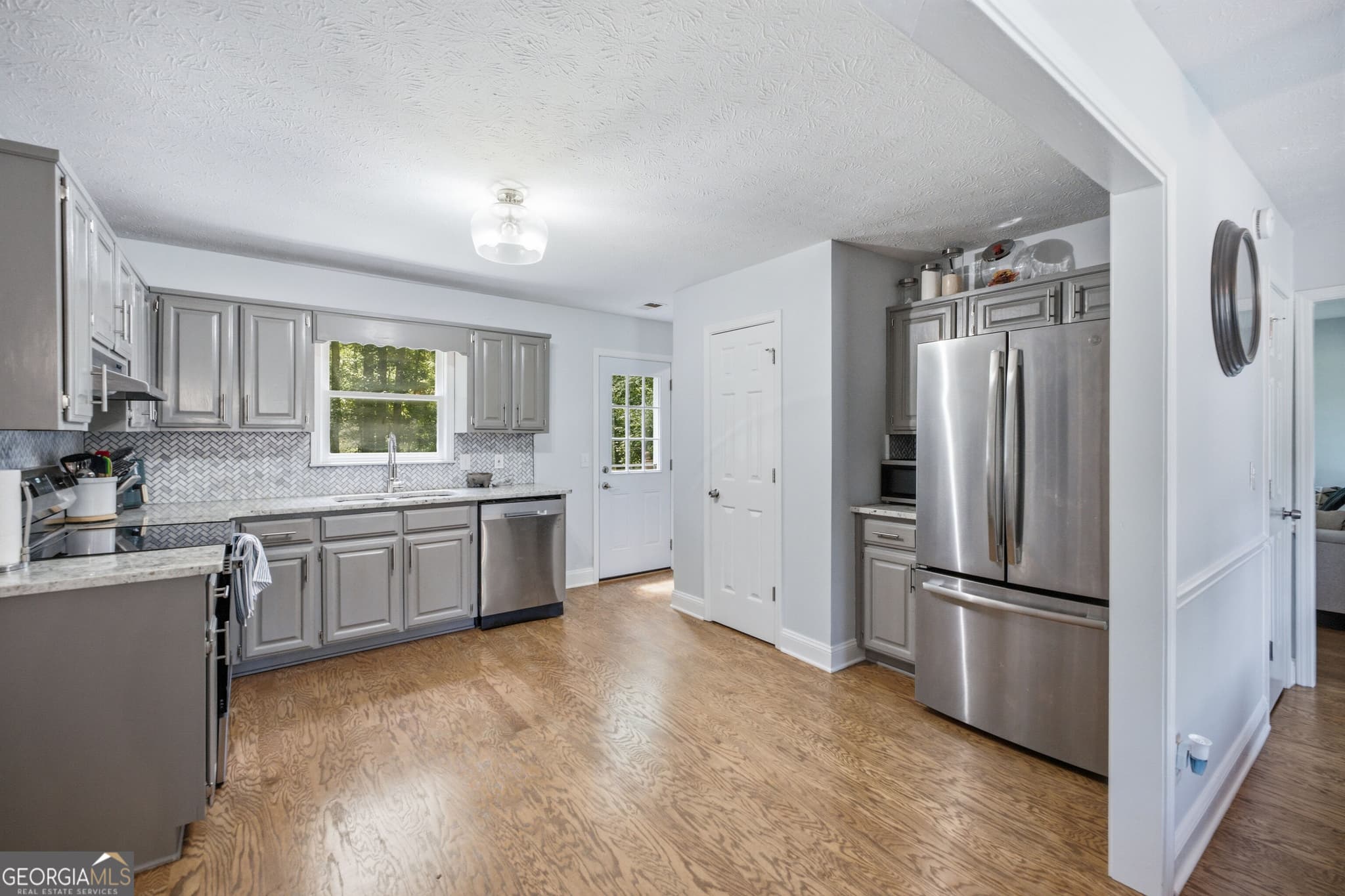 3 bedroom, 2.5 bathroom, 1,344 sq ft single family residence for sale at 1640 Riverview Court, Auburn, GA 30011 — photo 10