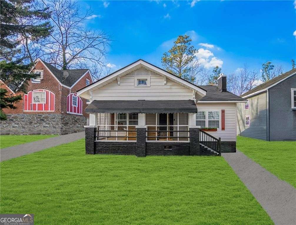 4 bedroom, 2 bathroom, 1,372 sq ft single family residence for sale at 684 S Elizabeth Place, Atlanta, GA 30318 — photo 1 of 19