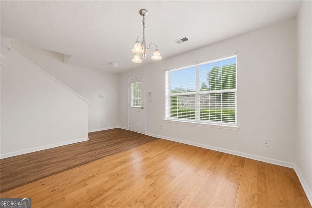 2 bedroom, 2.5 bathroom, 1,458 sq ft townhouse for sale at 413 Inkberry Drive, Atlanta, GA 30349 — photo 2