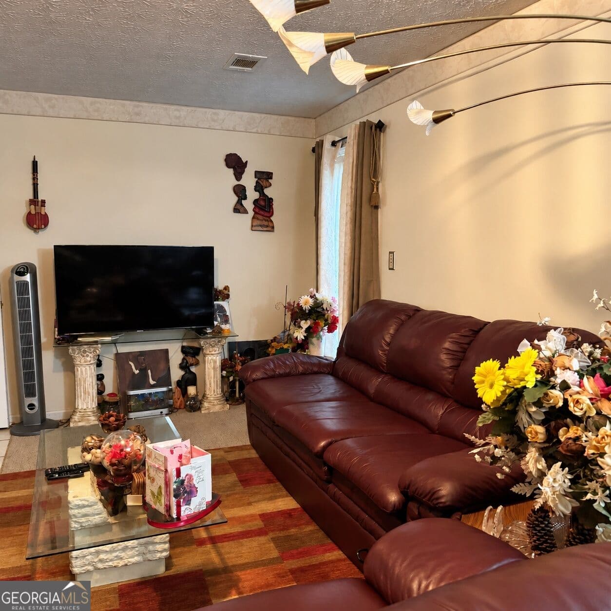 4 bedroom, 3 bathroom, 1,720 sq ft single family residence for sale at 7571 Kevin Place, Jonesboro, GA 30236 — photo 3