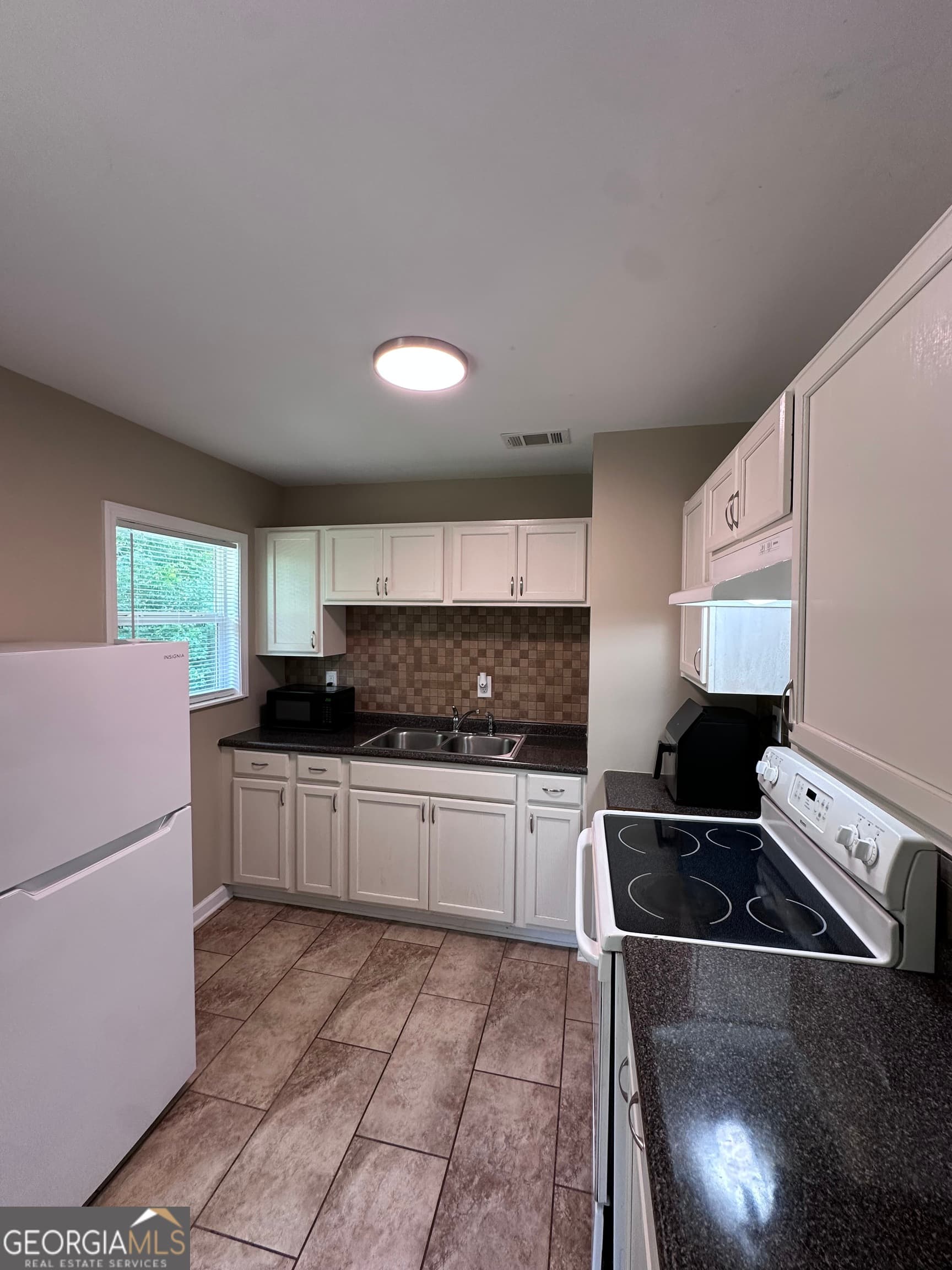 3 bedroom, 1 bathroom, 792 sq ft single family residence for sale at 4315 Elkan Avenue, Macon, GA 31206 — photo 7