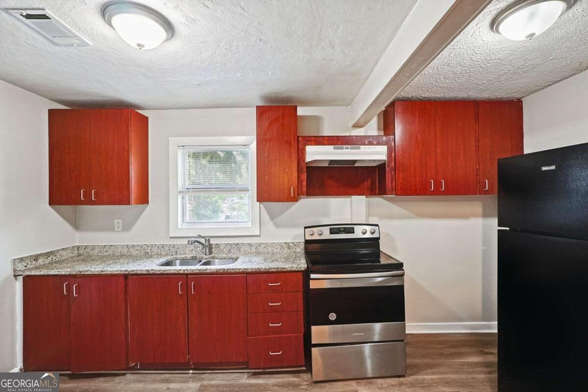 2 bedroom, 1 bathroom, 1,164 sq ft single family residence for sale at 2903 Blount Street, East Point, GA 30344 — photo 4