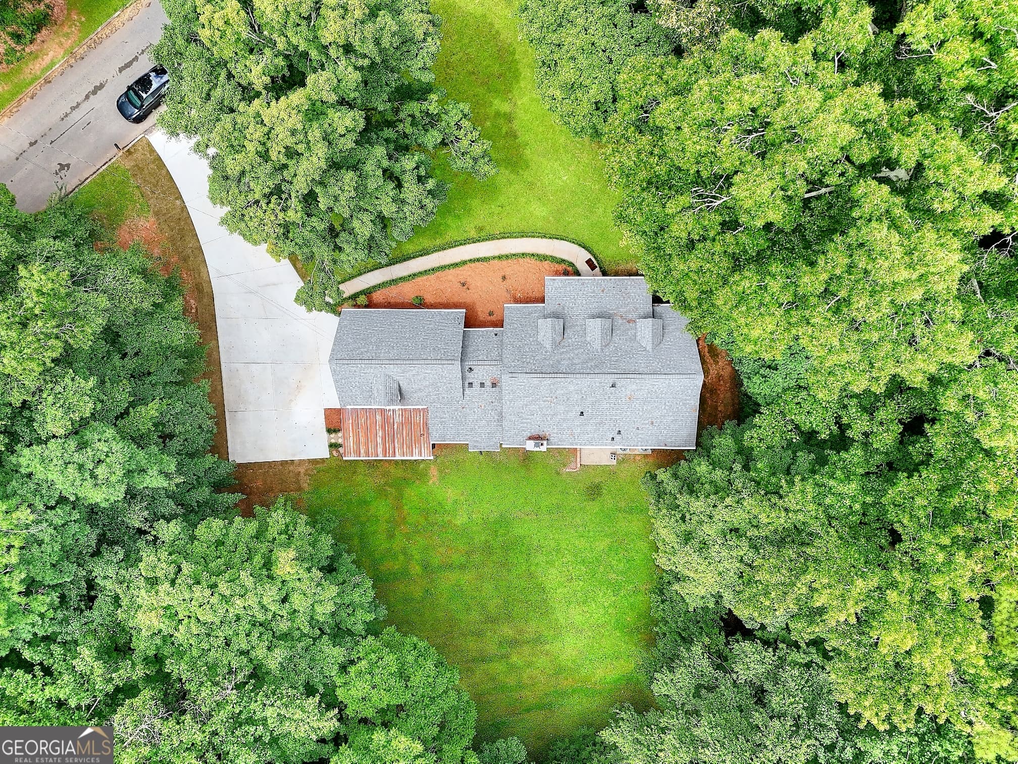 5 bedroom, 3.5 bathroom, 3,882 sq ft single family residence for sale at 66 SW Lockring Drive, Lilburn, GA 30047 — photo 6