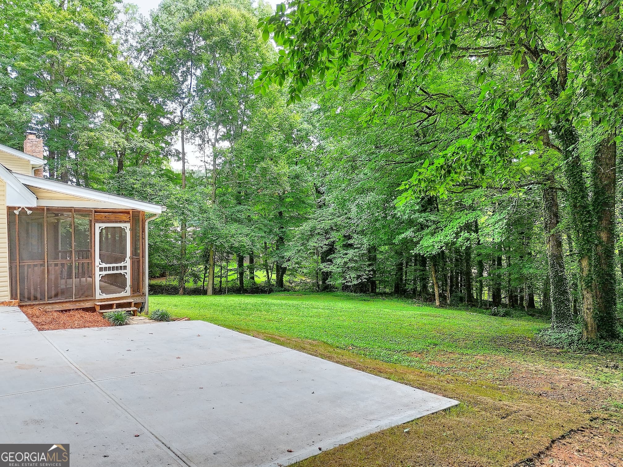 5 bedroom, 3.5 bathroom, 3,882 sq ft single family residence for sale at 66 SW Lockring Drive, Lilburn, GA 30047 — photo 5