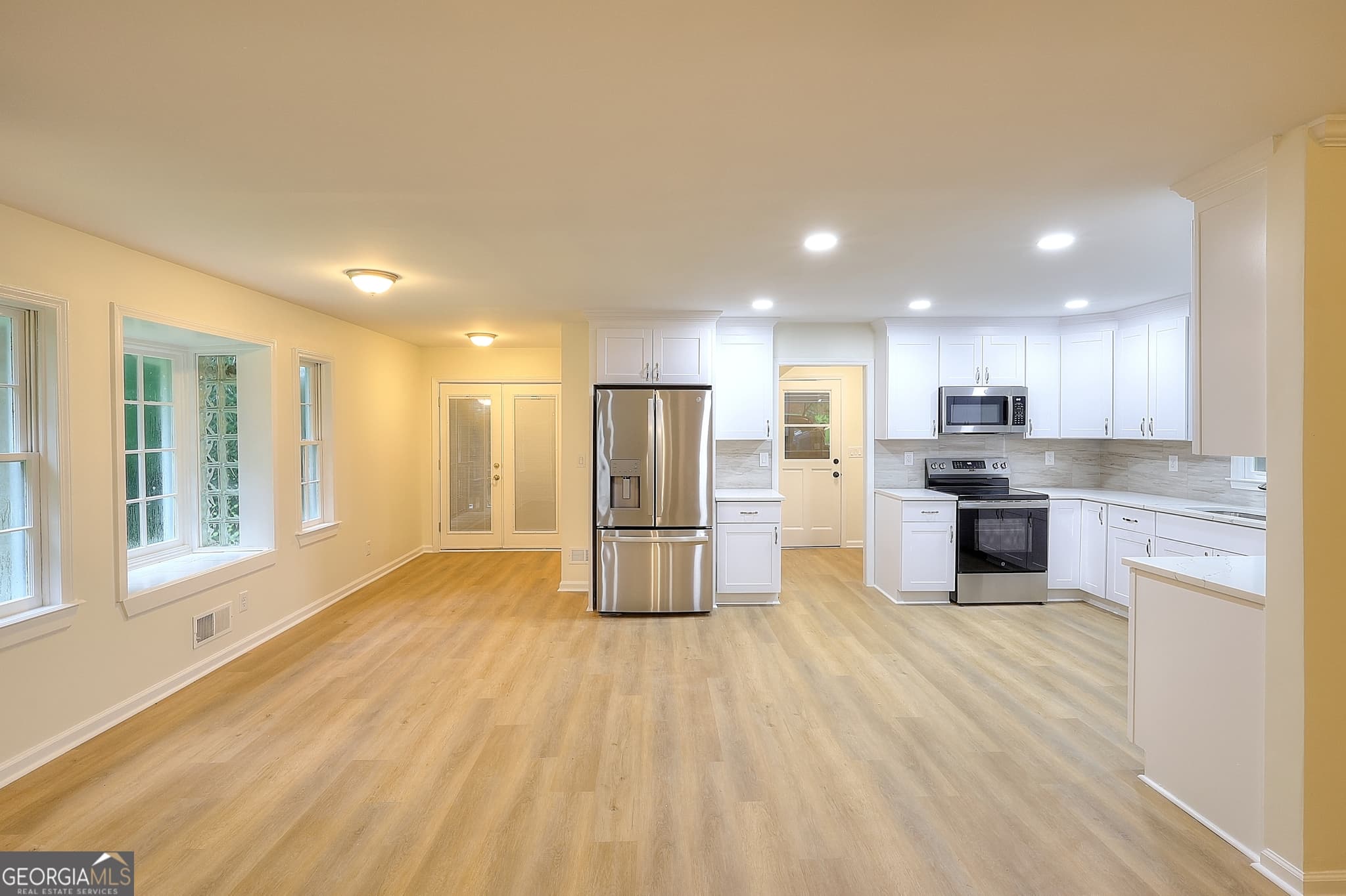 5 bedroom, 3.5 bathroom, 3,882 sq ft single family residence for sale at 66 SW Lockring Drive, Lilburn, GA 30047 — photo 10