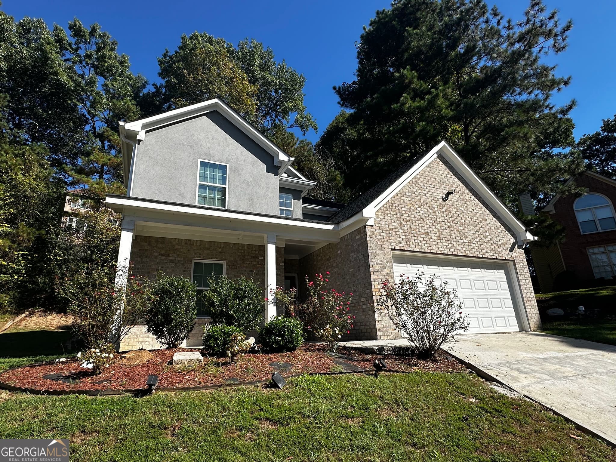 4 bedroom, 3.5 bathroom, 2,036 sq ft single family residence for sale at 6938 Shadow Ridge Lane, Stone Mountain, GA 30087 — photo 3