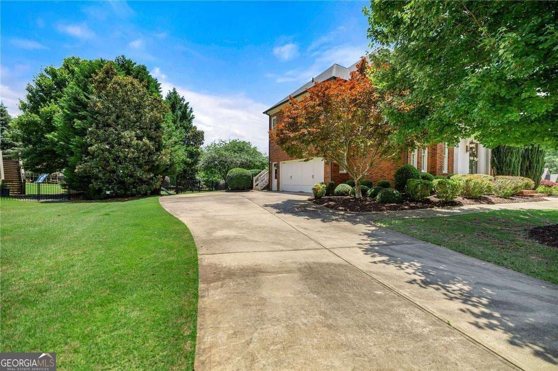 5 bedroom, 4.5 bathroom, 5,263 sq ft single family residence for sale at 1021 Oxford Way, Watkinsville, GA 30677 — photo 3