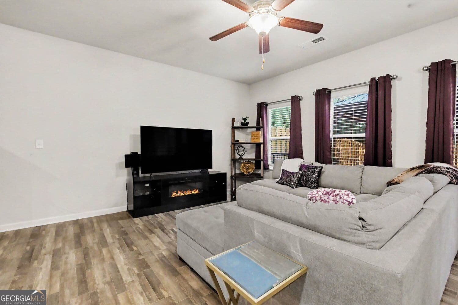 3 bedroom, 2.5 bathroom, 1,880 sq ft townhouse for sale at 5103 Lower Elm Street, Atlanta, GA 30349 — photo 2