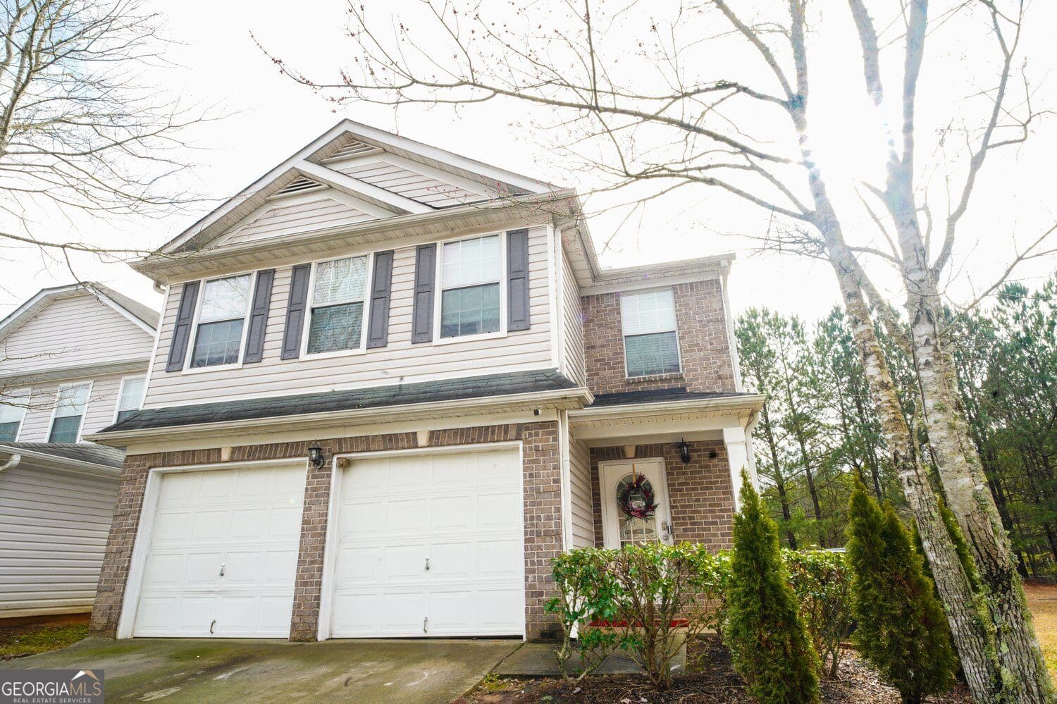 4 bedroom, 2.5 bathroom, 2,238 sq ft single family residence for sale at 1942 Eshelman Court, Atlanta, GA 30349 — photo 2