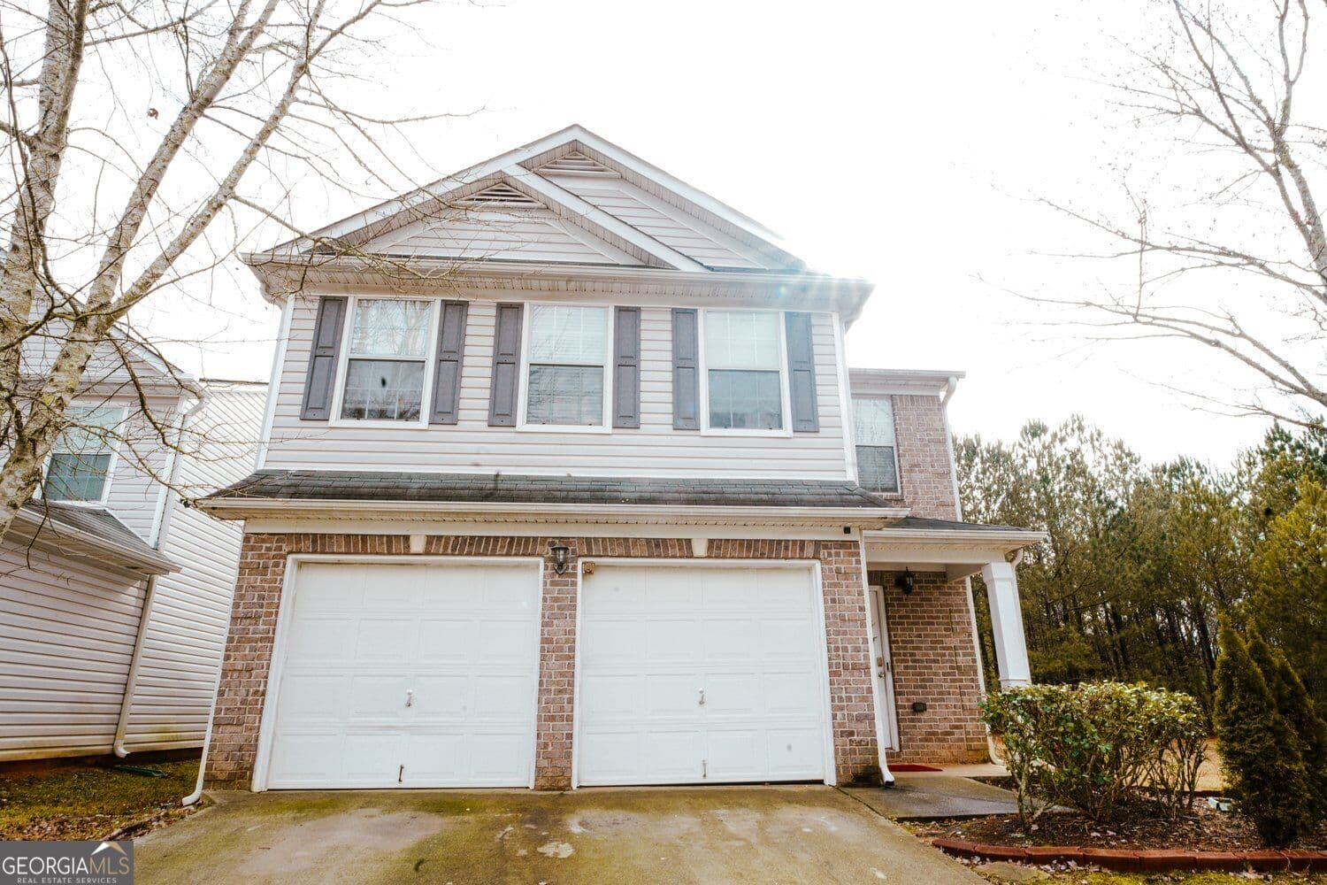 4 bedroom, 2.5 bathroom, 2,238 sq ft single family residence for sale at 1942 Eshelman Court, Atlanta, GA 30349 — photo 1 of 30