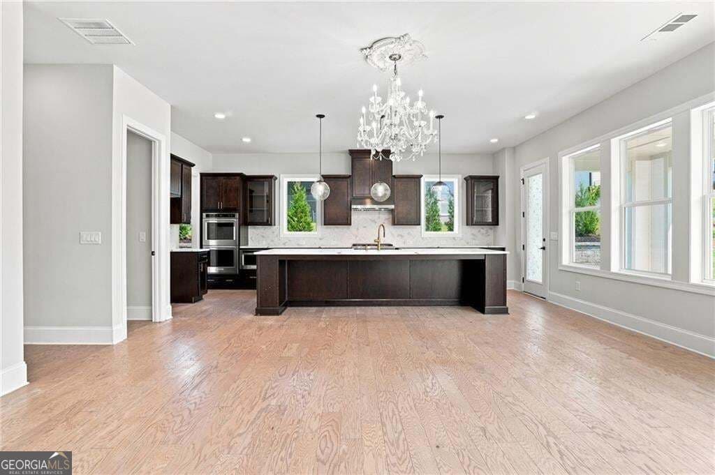 5 bedroom, 5.5 bathroom, 3,990 sq ft single family residence for sale at 886 Keystone Drive, Woodstock, GA 30188 — photo 9