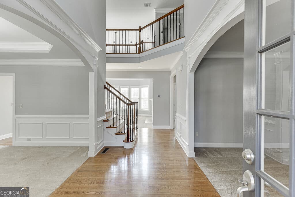 6 bedroom, 5 bathroom, 4,995 sq ft single family residence for sale at 7708 Sleepy Lagoon Way, Flowery Branch, GA 30542 — photo 3