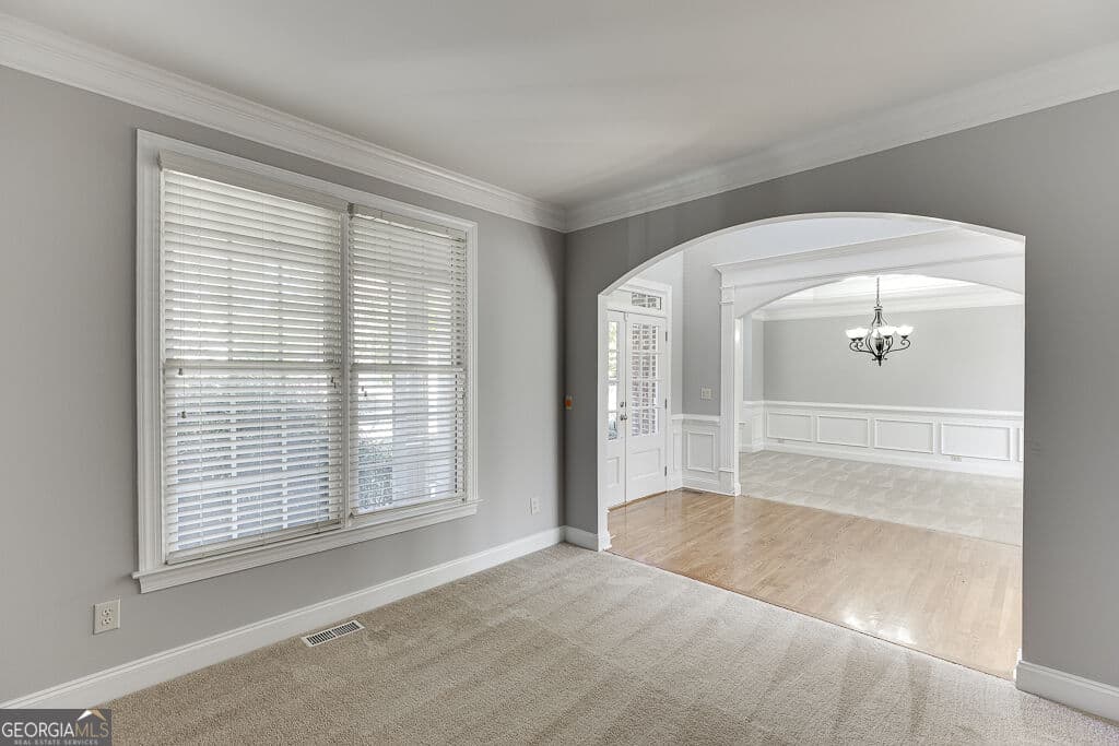 6 bedroom, 5 bathroom, 4,995 sq ft single family residence for sale at 7708 Sleepy Lagoon Way, Flowery Branch, GA 30542 — photo 5