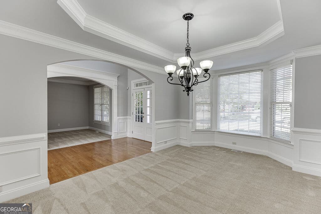 6 bedroom, 5 bathroom, 4,995 sq ft single family residence for sale at 7708 Sleepy Lagoon Way, Flowery Branch, GA 30542 — photo 9