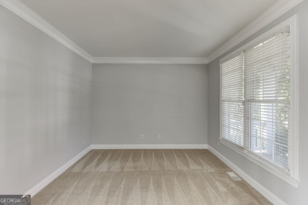 6 bedroom, 5 bathroom, 4,995 sq ft single family residence for sale at 7708 Sleepy Lagoon Way, Flowery Branch, GA 30542 — photo 4