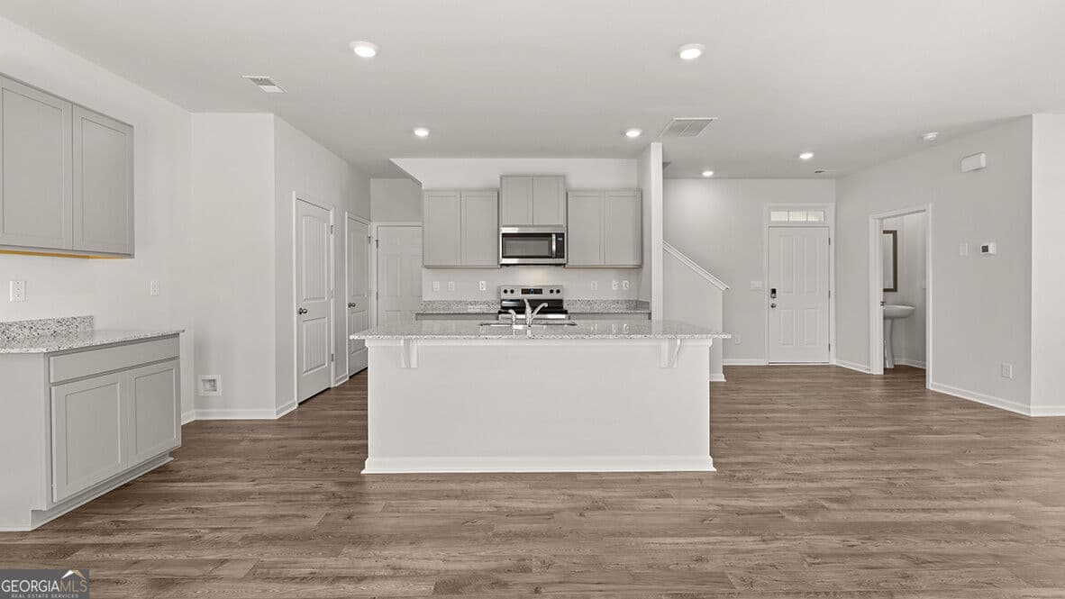 4 bedroom, 2.5 bathroom, 1,927 sq ft single family residence for sale at 5445 Brightwater Street, South Fulton, GA 30349 — photo 4