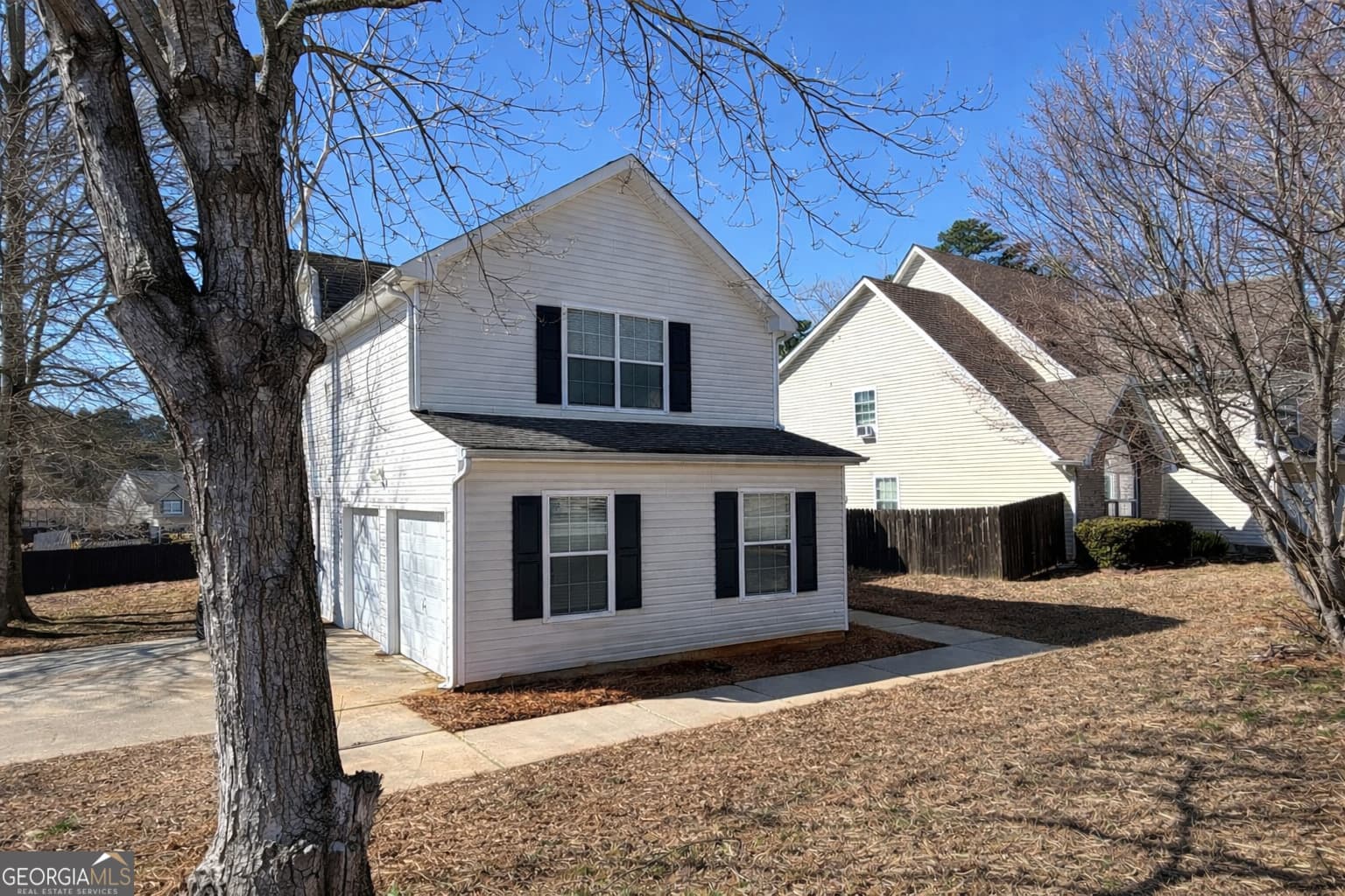 4 bedroom, 2.5 bathroom, 2,036 sq ft single family residence for sale at 10769 James Drive, Jonesboro, GA 30238 — photo 3