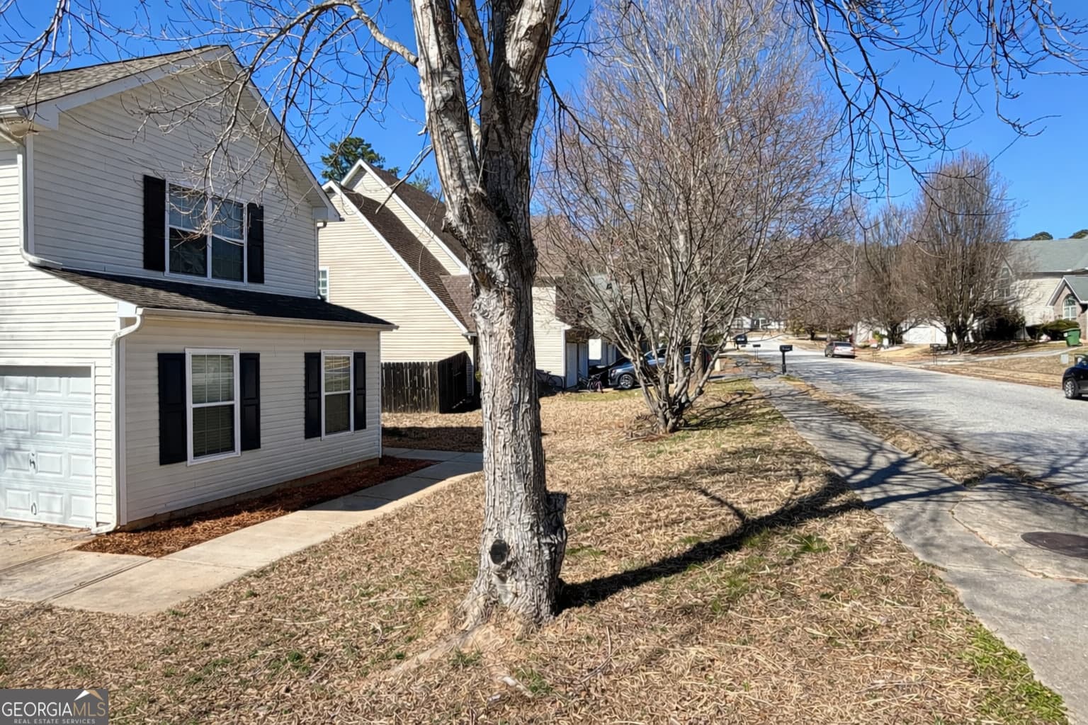 4 bedroom, 2.5 bathroom, 2,036 sq ft single family residence for sale at 10769 James Drive, Jonesboro, GA 30238 — photo 4