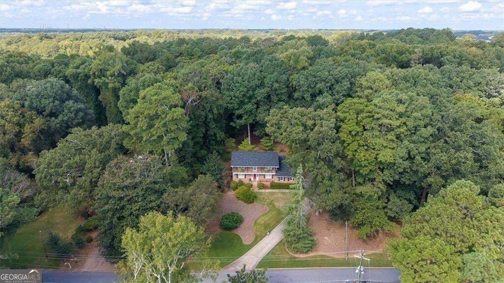 4 bedroom, 3 bathroom, 2,620 sq ft single family residence for sale at 2206 Deer Ridge Drive, Smoke Rise, GA 30087 — photo 3