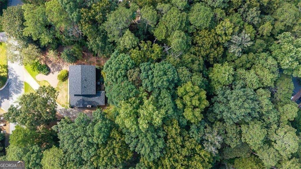 4 bedroom, 3 bathroom, 2,620 sq ft single family residence for sale at 2206 Deer Ridge Drive, Smoke Rise, GA 30087 — photo 4