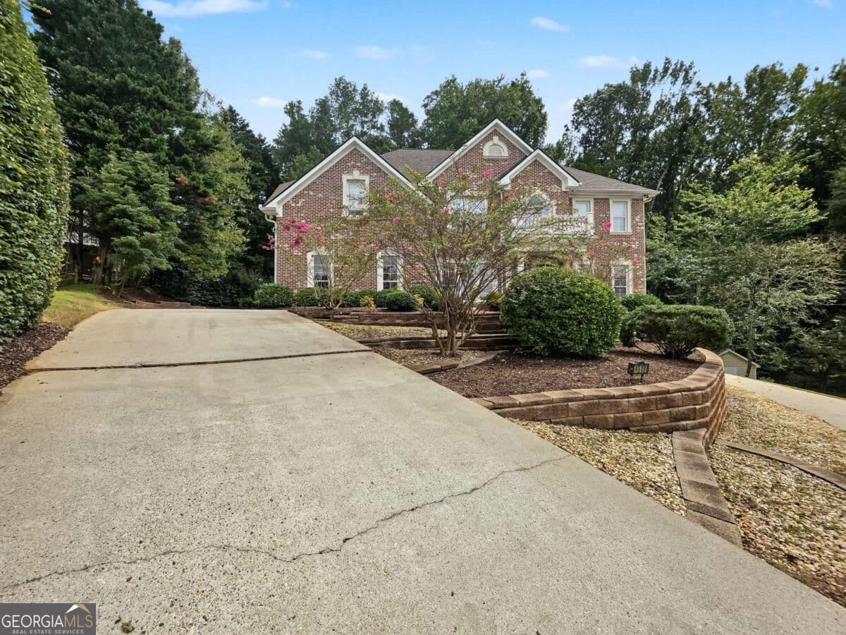 7 bedroom, 6 bathroom single family residence for sale at 4619 Kiplin Lake Court, Sugar Hill, GA 30518 — photo 3