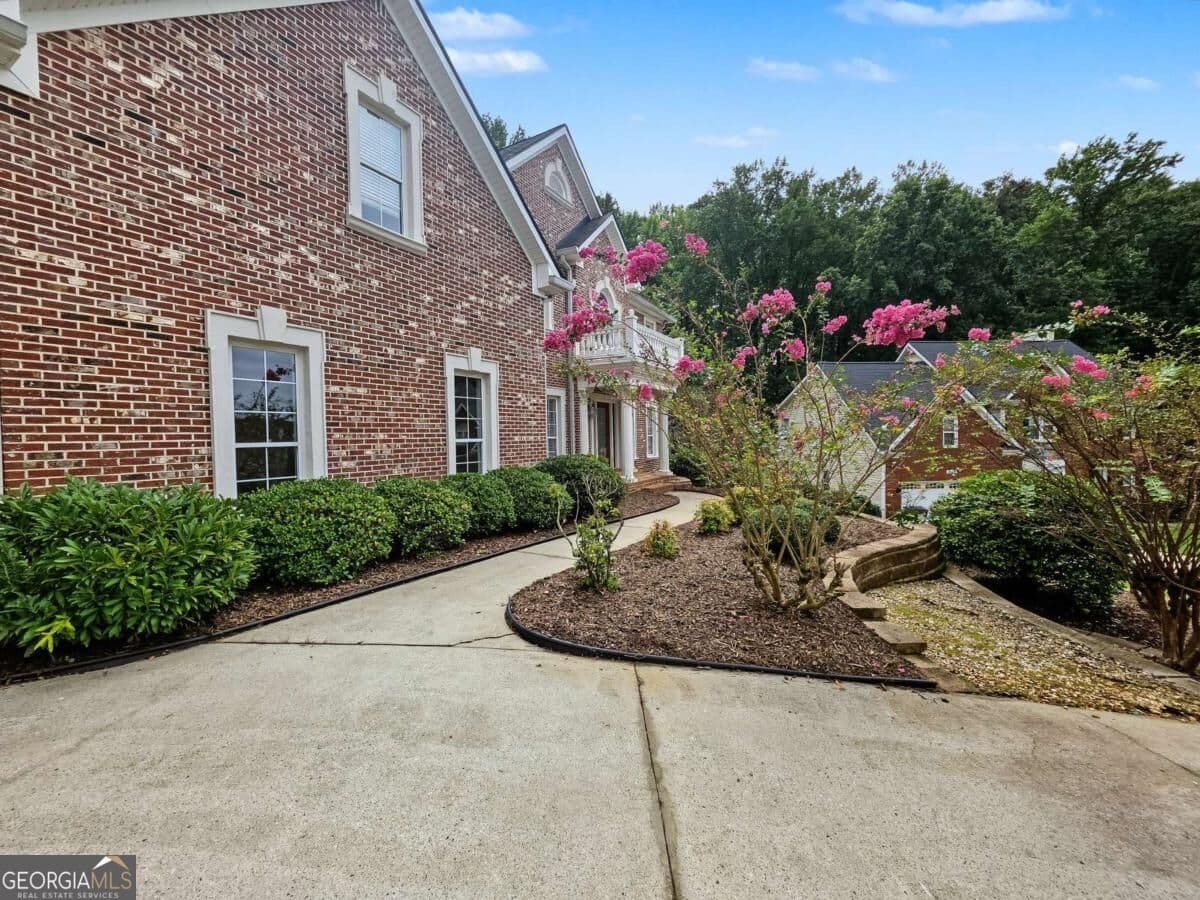 7 bedroom, 6 bathroom single family residence for sale at 4619 Kiplin Lake Court, Sugar Hill, GA 30518 — photo 5