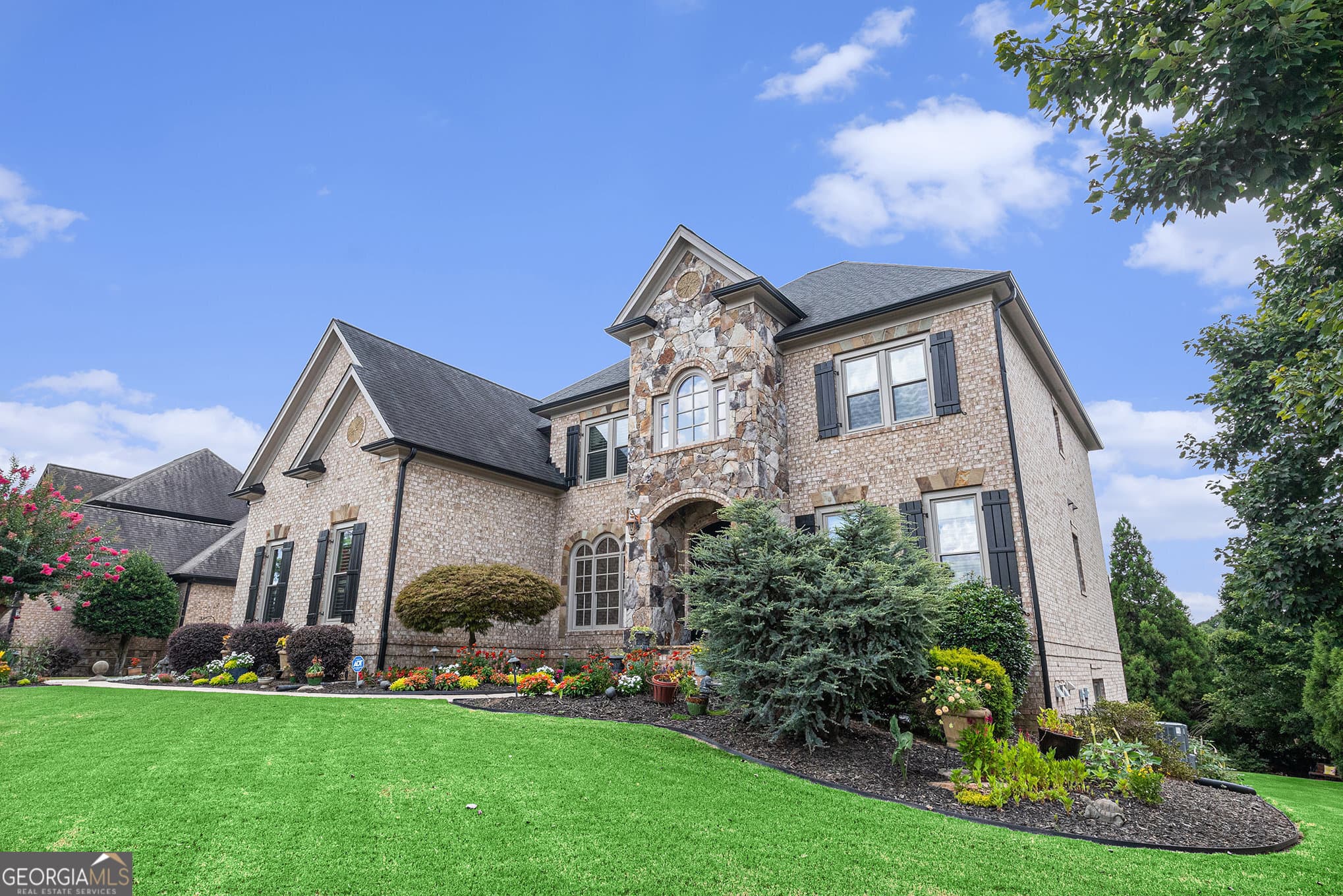 6 bedroom, 6 bathroom, 6,598 sq ft single family residence for sale at 2088 Skybrooke Court, Hoschton, GA 30548 — photo 2