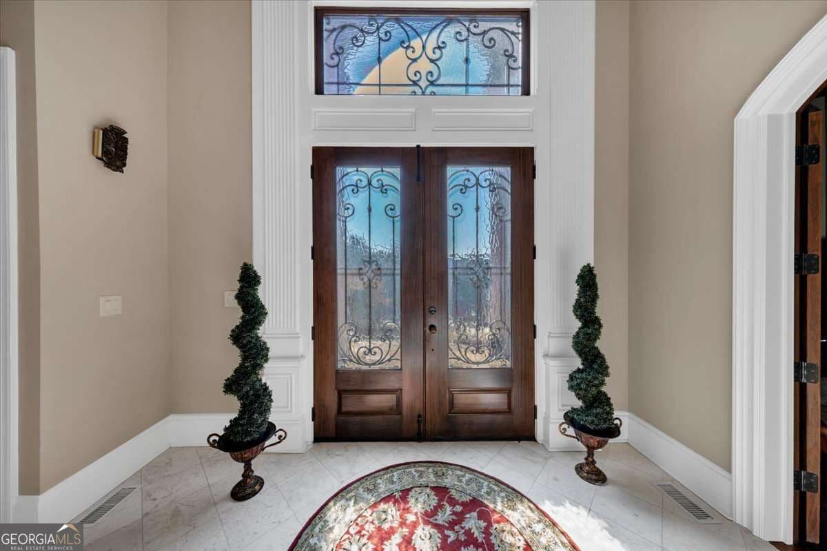 7 bedroom, 6 bathroom, 10,800 sq ft single family residence for sale at 3124 Watsons Bend, Milton, GA 30004 — photo 9
