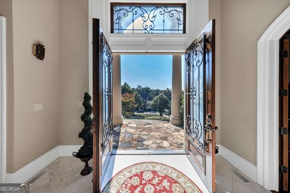 7 bedroom, 6 bathroom, 10,800 sq ft single family residence for sale at 3124 Watsons Bend, Milton, GA 30004 — photo 10