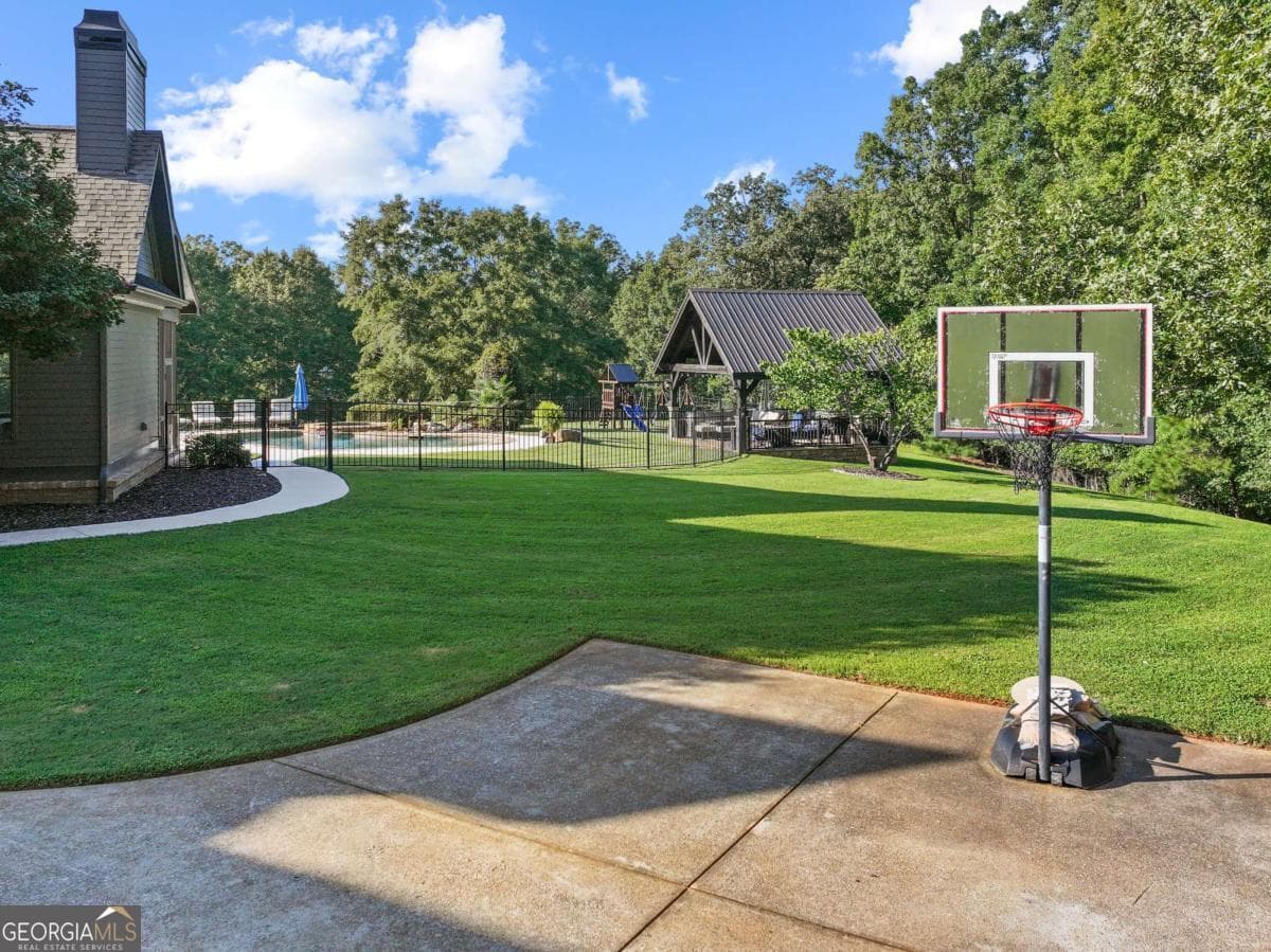 5 bedroom, 3.5 bathroom, 6,513 sq ft single family residence for sale at 5846 Conner Road, Flowery Branch, GA 30542 — photo 7
