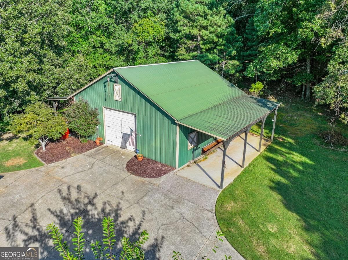 5 bedroom, 3.5 bathroom, 6,513 sq ft single family residence for sale at 5846 Conner Road, Flowery Branch, GA 30542 — photo 5