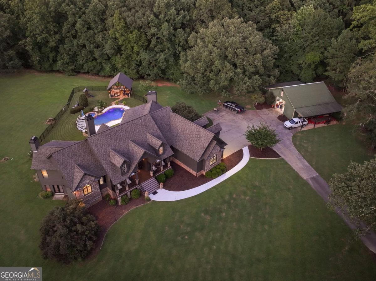 5 bedroom, 3.5 bathroom, 6,513 sq ft single family residence for sale at 5846 Conner Road, Flowery Branch, GA 30542 — photo 9