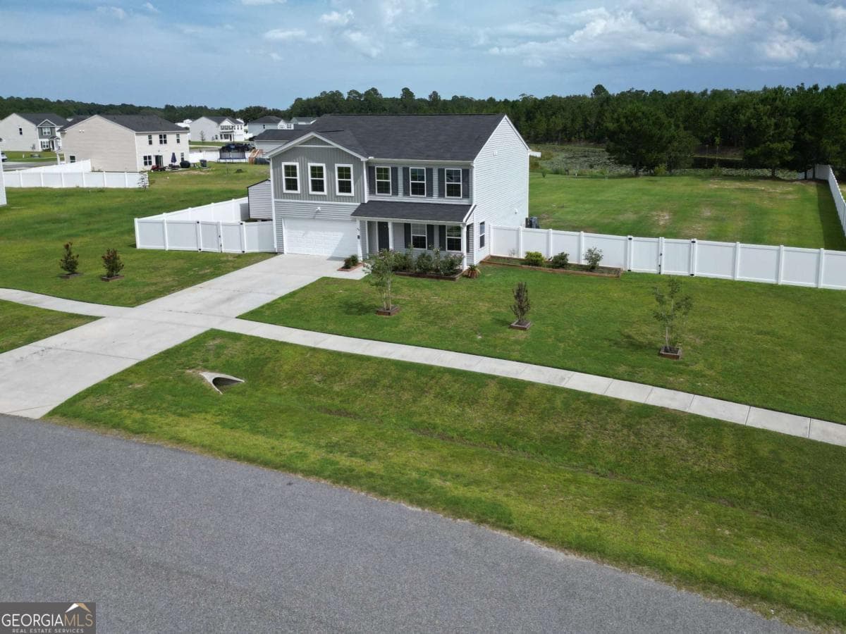 5 bedroom, 3 bathroom, 2,360 sq ft single family residence for sale at 455 Tondee Way, Midway, GA 31320 — photo 2