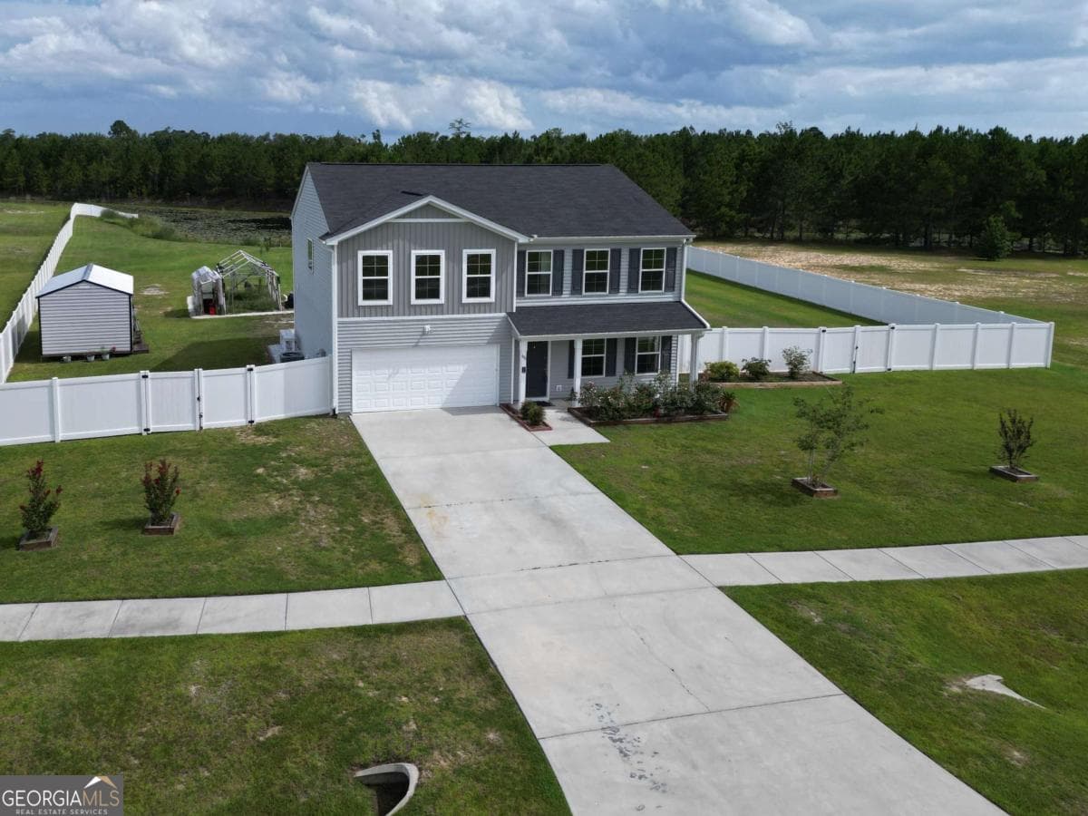 5 bedroom, 3 bathroom, 2,360 sq ft single family residence for sale at 455 Tondee Way, Midway, GA 31320 — photo 3