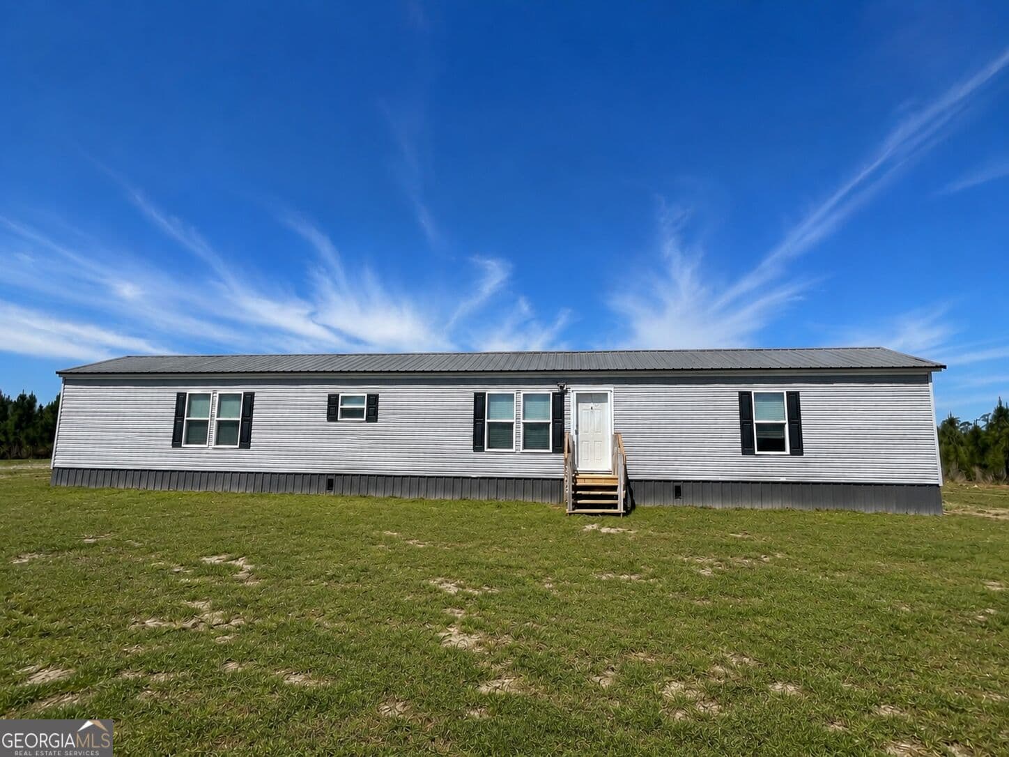 3 bedroom, 2 bathroom, 1,216 sq ft manufactured home,single family residence for sale at 1153 Midway Church Road, Baxley, GA 31513 — photo 1 of 13