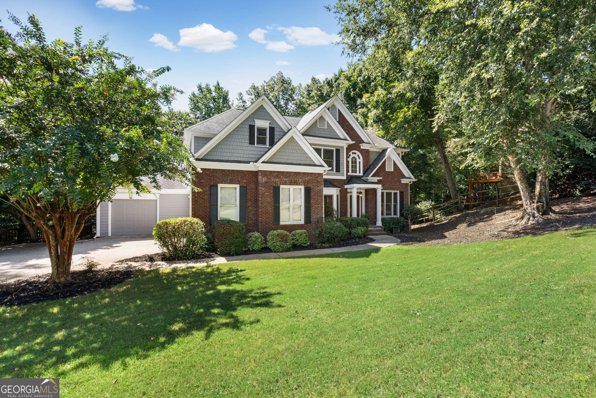 6 bedroom, 5 bathroom, 4,583 sq ft single family residence for sale at 4920 Pond Ridge Lane, Cumming, GA 30041 — photo 2