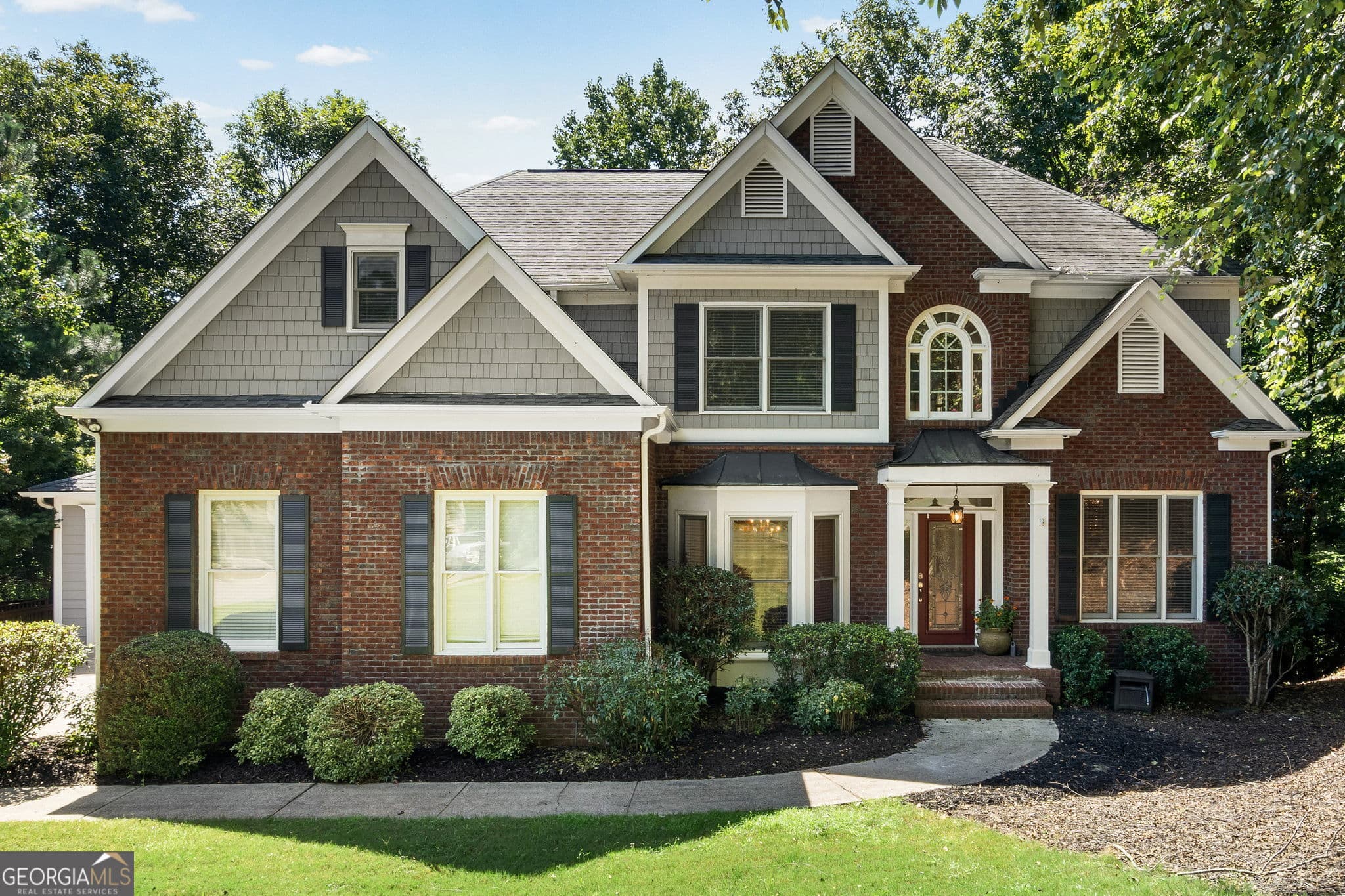 6 bedroom, 5 bathroom, 4,583 sq ft single family residence for sale at 4920 Pond Ridge Lane, Cumming, GA 30041 — photo 1 of 45
