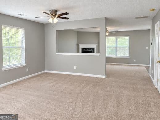 4 bedroom, 2.5 bathroom, 2,409 sq ft single family residence for sale at 3505 Devon Chase Road, South Fulton, GA 30349 — photo 4