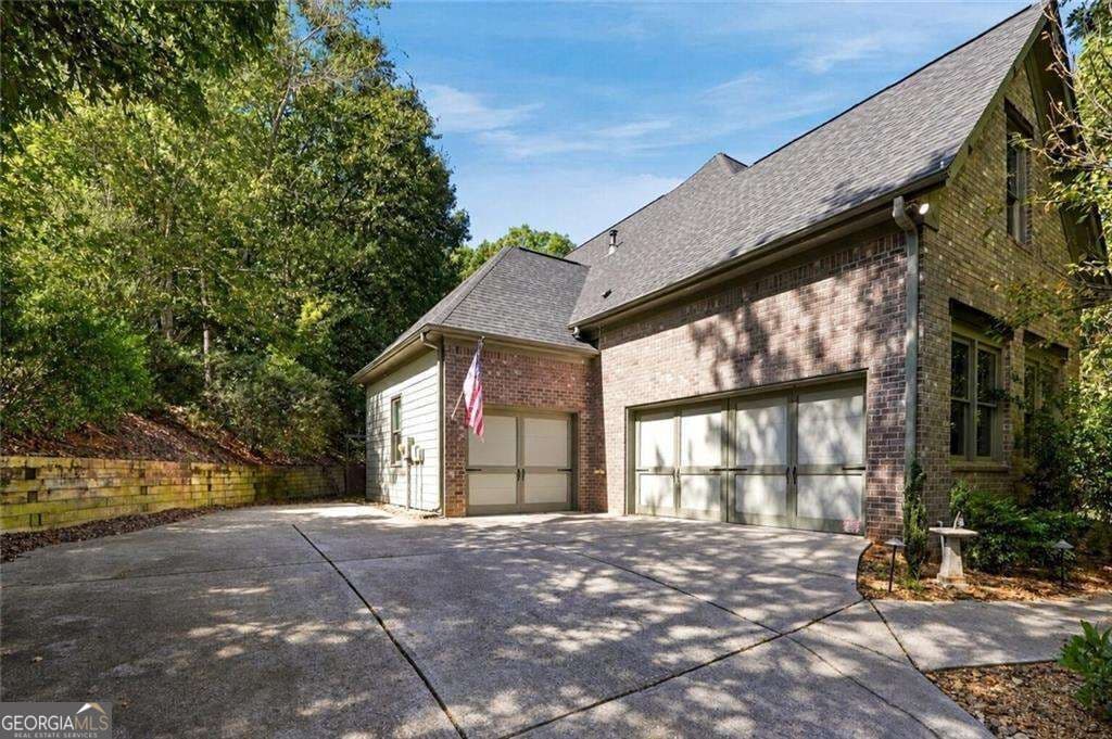 6 bedroom, 4.5 bathroom single family residence for sale at 3725 River Club Drive, Cumming, GA 30041 — photo 3