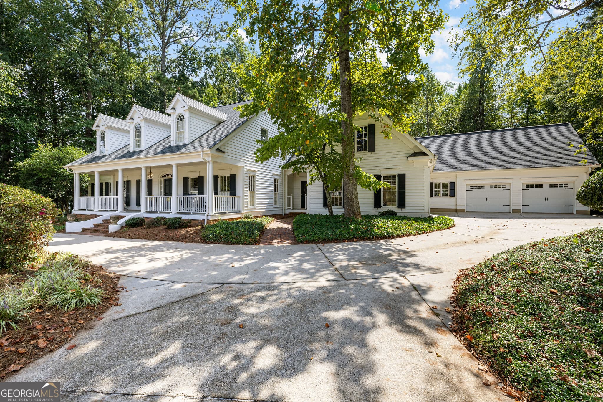 7 bedroom, 6 bathroom, 5,571 sq ft single family residence for sale at 65 Highlands Point, Newnan, GA 30265 — photo 4