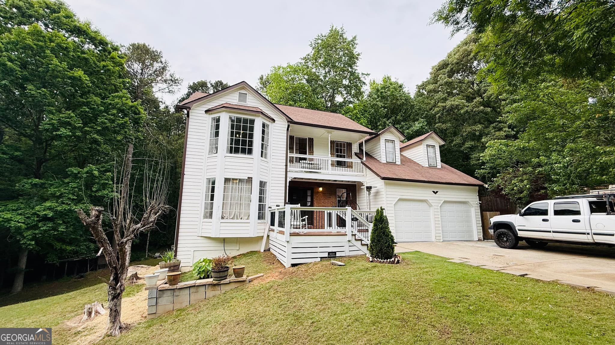 6 bedroom, 2.5 bathroom, 850 sq ft single family residence for sale at 4041 Brittan Glade Trail, Snellville, GA 30039 — photo 2